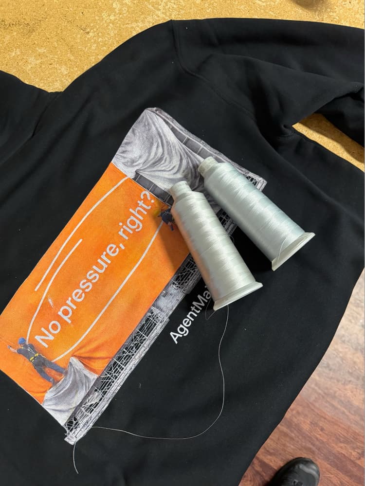 Embroidery thread on the hoodie in production
